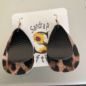 Handmade earrings all different colors sizes and styles.